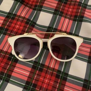 Regular size sunglasses in white color,bridge center in gold color .